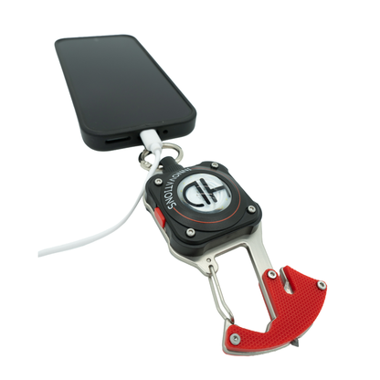 HD Multi-Mission Phone Lanyard, installed on a phone while the phone is charging to show that the product doesn't interfere with charging